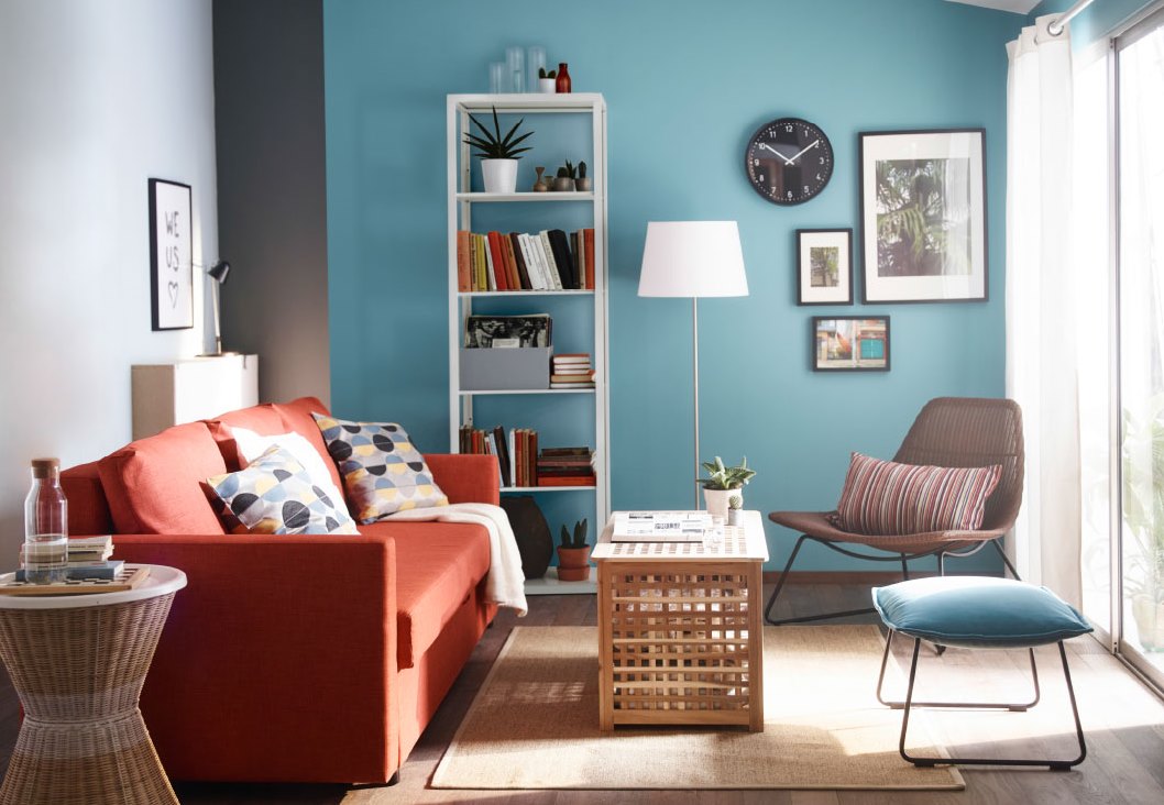 Living room with an orange sofa