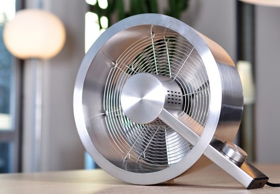 Fan on a table with a modern metal design