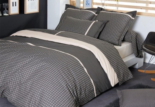 Bed with grey percal cotton bedlinen