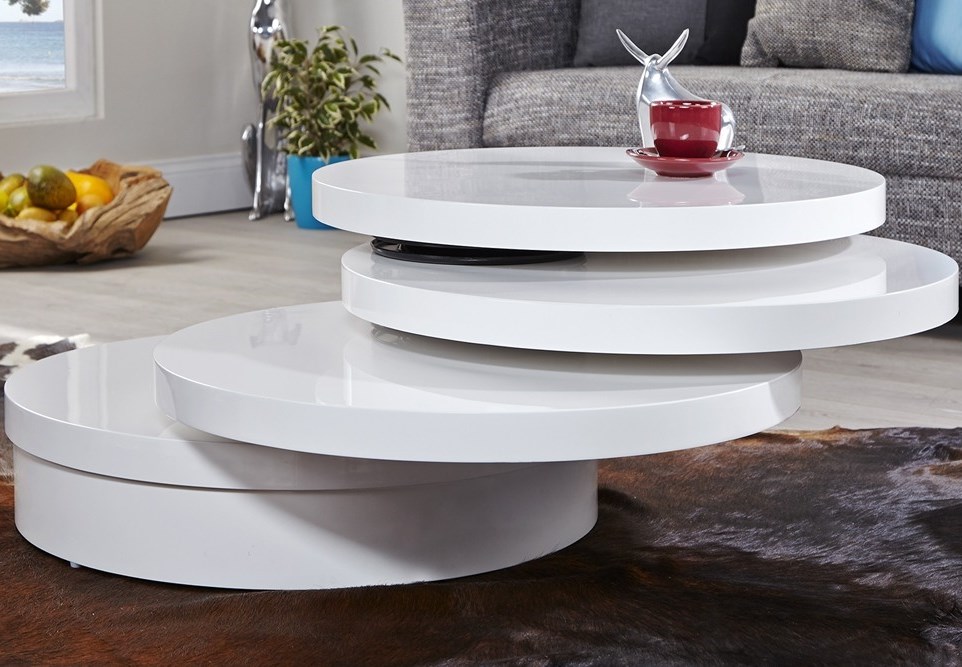 Coffee table with pivoting trays