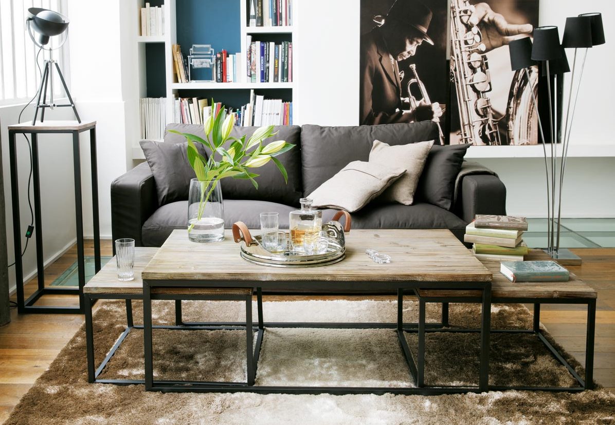 Coffee table with integrated nesting tables