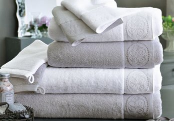 Set of towels in a bathroom in neutral colors