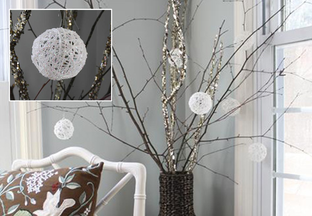 Home-made christmas balls on branches