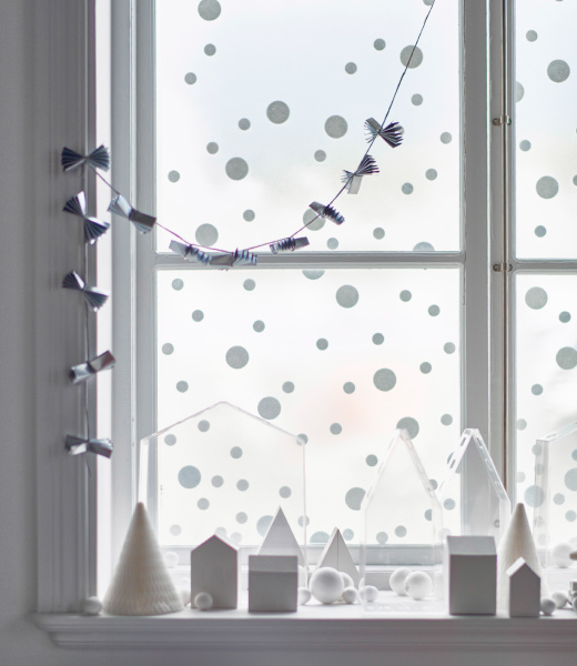 Decorative white snowflakes on the window