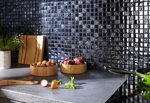 Dark glass mosaics on a kitchen splashback