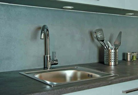 Polished concrete coating on a kitchen splashback