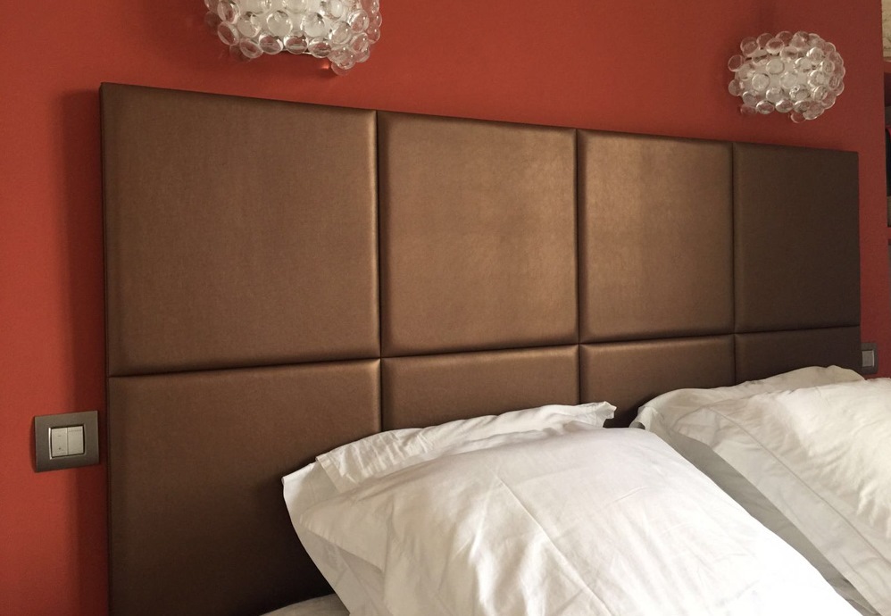 Headboards with stick leather tiles