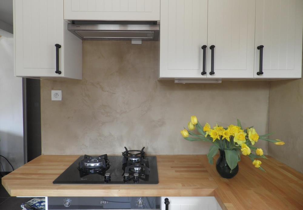 Waxed concrete backsplash, from Mary Deco