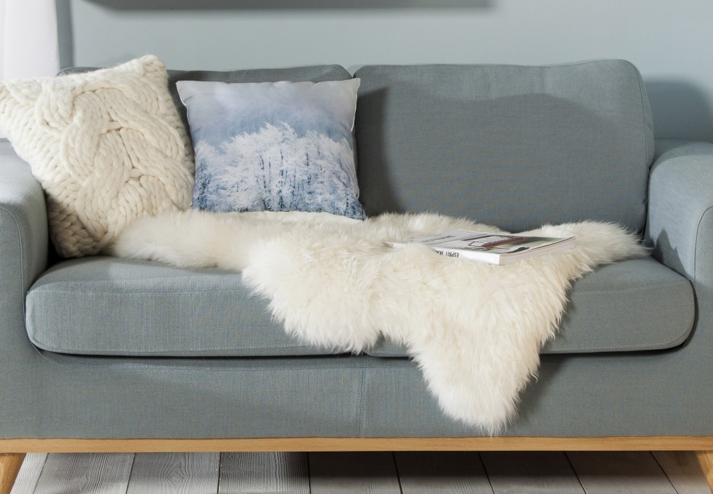 A sheepskin on a sofa