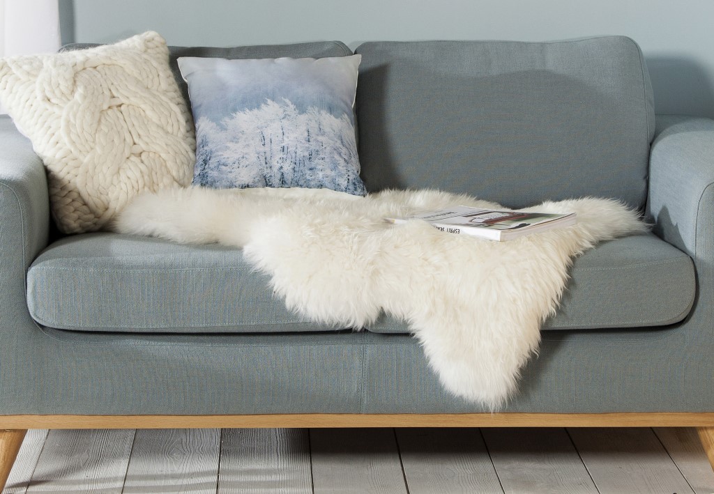 sheepskin on a grey sofa